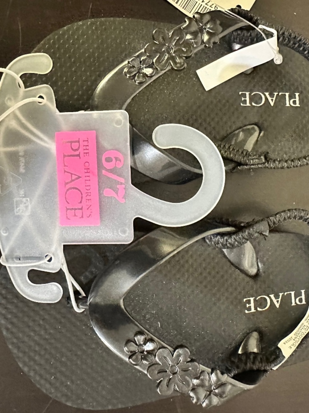The children’s place flip flops, toddler size 6/7